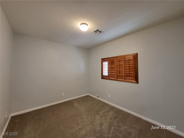 9530 Windsor Forest Ct, Las Vegas, NV 89123 - unfurnished room with dark carpet and baseboards