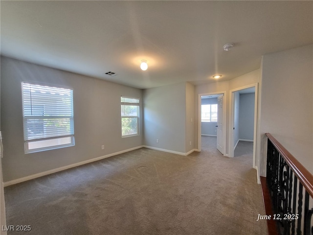 9530 Windsor Forest Ct, Las Vegas, NV 89123 - spare room featuring a smoke detector, plenty of natural light, and carpet floors