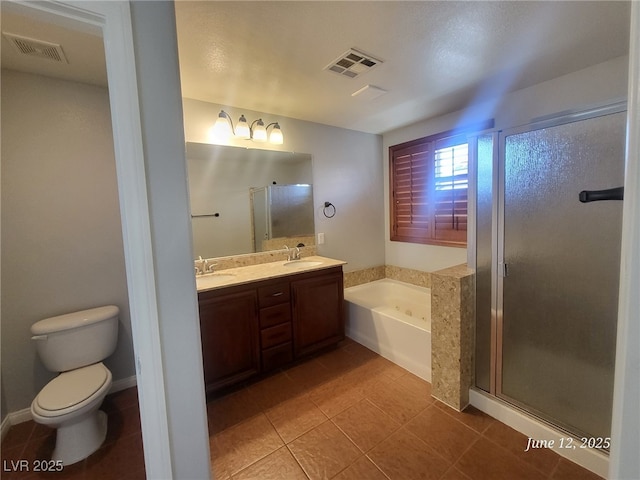 9530 Windsor Forest Ct, Las Vegas, NV 89123 - bathroom featuring a garden tub, double vanity, a shower stall, and tile patterned floors