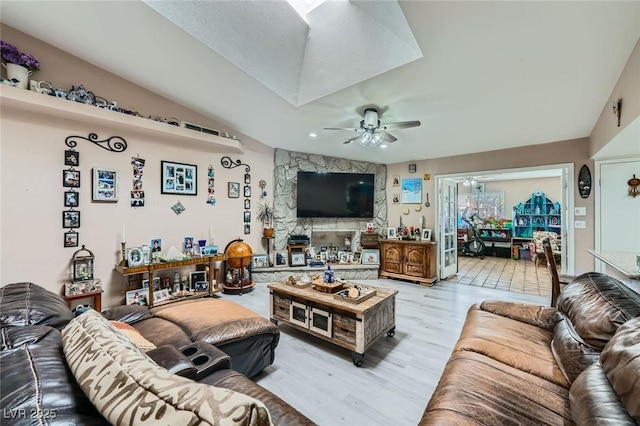 6616 Celeste Ave, Las Vegas, NV 89107 - living room featuring a ceiling fan, wood finished floors, vaulted ceiling, and recessed lighting