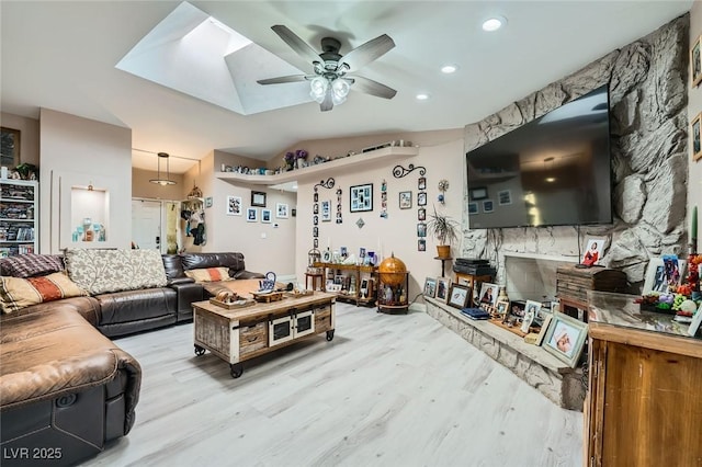 6616 Celeste Ave, Las Vegas, NV 89107 - living area featuring a ceiling fan, a skylight, wood finished floors, and recessed lighting