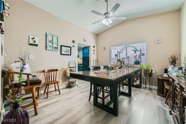 6616 Celeste Ave, Las Vegas, NV 89107 - dining space with light wood-style floors, lofted ceiling, and a ceiling fan