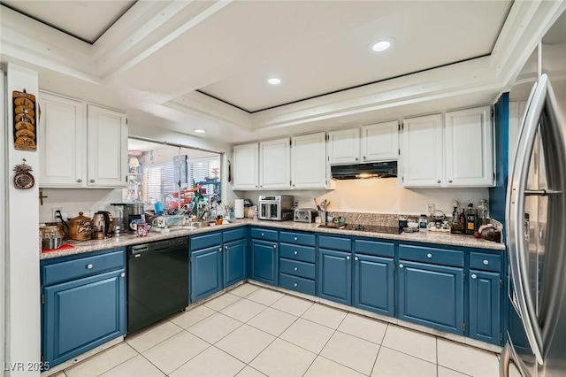 6616 Celeste Ave, Las Vegas, NV 89107 - kitchen with black appliances, a tray ceiling, blue cabinets, range hood, and white cabinetry