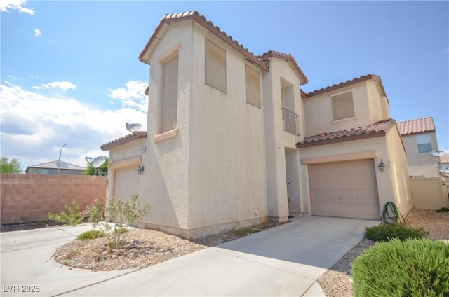6098 Darkfeather Way, Las Vegas, NV 89139 - view of front of home with a tile roof, driveway, stucco siding, and an attached garage