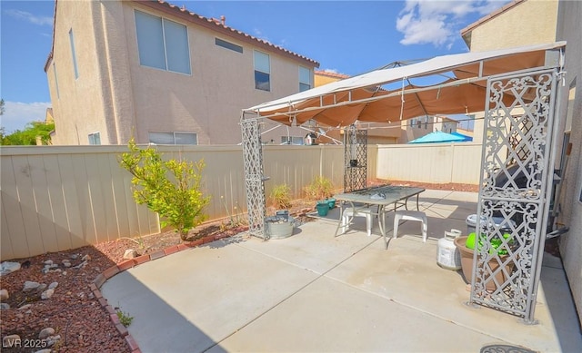 6098 Darkfeather Way, Las Vegas, NV 89139 - fenced backyard featuring a patio area
