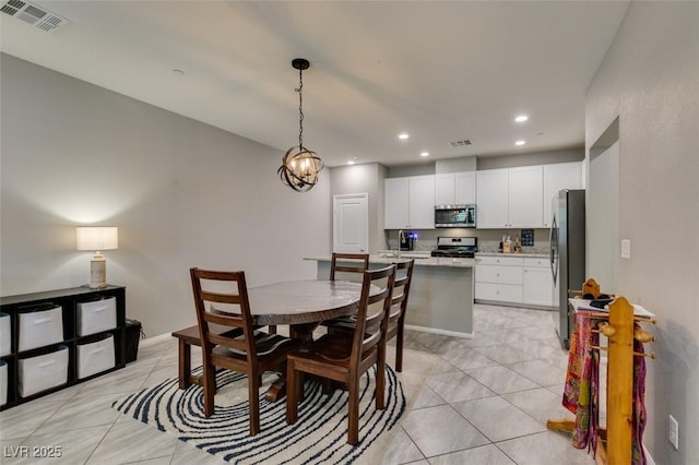 3166 Via Da Vinci, Henderson, NV 89044 - dining room featuring recessed lighting and a chandelier