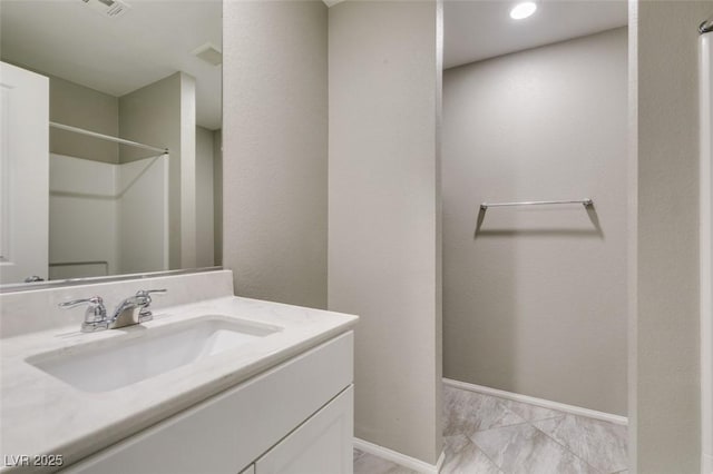 3166 Via Da Vinci, Henderson, NV 89044 - full bathroom with vanity, a shower, and marble finish floors