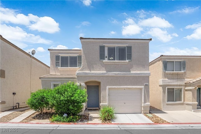9957 Fine Fern St, Las Vegas, NV 89183 - view of front of house with stucco siding and an attached garage