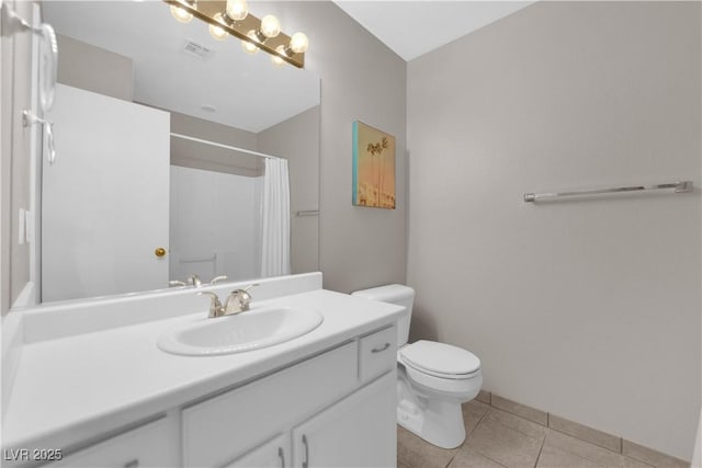 9957 Fine Fern St, Las Vegas, NV 89183 - bathroom with tile patterned flooring, vanity, and curtained shower
