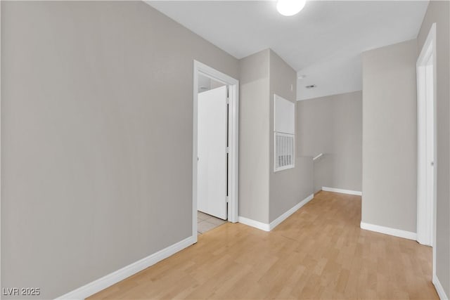 9957 Fine Fern St, Las Vegas, NV 89183 - unfurnished room featuring light wood finished floors and baseboards