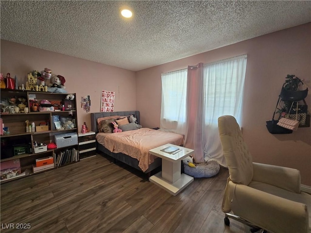 4823 El Tesoro Ave, Las Vegas, NV 89121 - bedroom featuring a textured ceiling, dark wood-type flooring, and recessed lighting