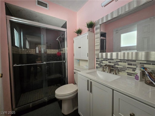 4823 El Tesoro Ave, Las Vegas, NV 89121 - full bath featuring a shower stall, vanity, and tasteful backsplash