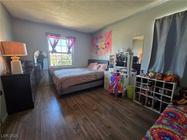 4823 El Tesoro Ave, Las Vegas, NV 89121 - bedroom with hardwood / wood-style floors and a textured ceiling