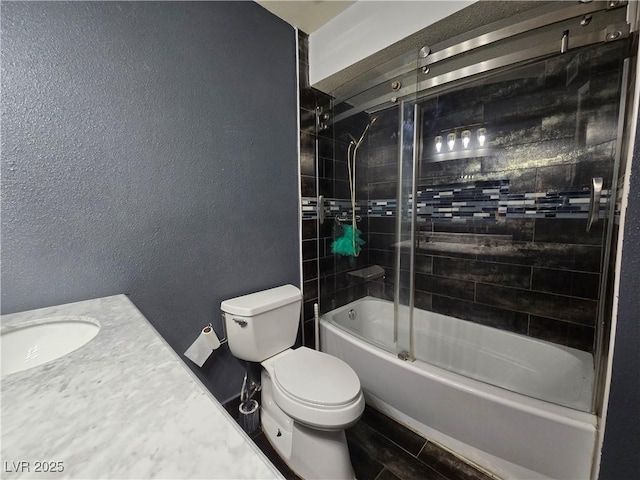 4823 El Tesoro Ave, Las Vegas, NV 89121 - full bathroom with shower / bath combination with glass door, vanity, and a textured wall