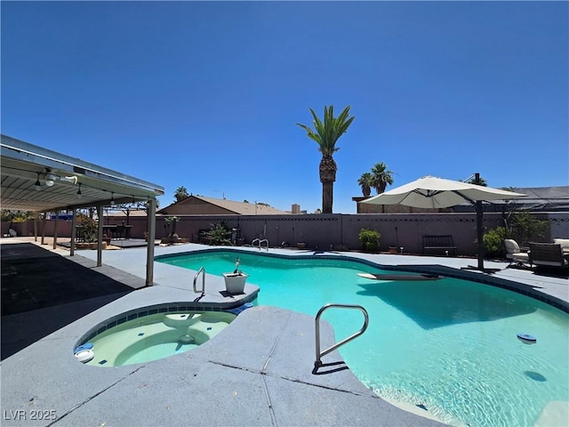 4823 El Tesoro Ave, Las Vegas, NV 89121 - view of swimming pool with an in-ground hot tub, a patio area, and a fenced backyard