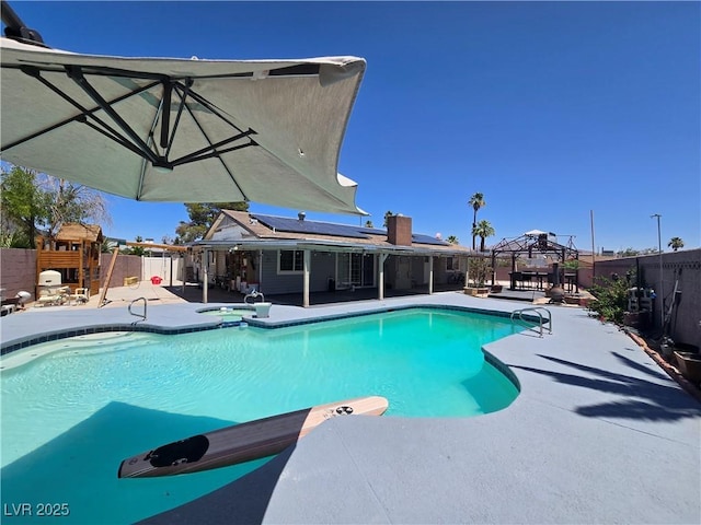 4823 El Tesoro Ave, Las Vegas, NV 89121 - view of swimming pool featuring a gazebo, a fenced backyard, a patio area, and an in-ground hot tub
