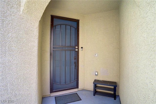 9864 Maspalomas St, Las Vegas, NV 89178 - doorway to property with stucco siding