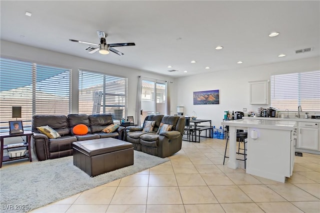 9864 Maspalomas St, Las Vegas, NV 89178 - living room with light tile patterned floors, ceiling fan, and recessed lighting
