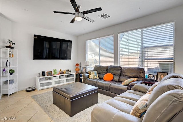 9864 Maspalomas St, Las Vegas, NV 89178 - living area with a ceiling fan and light tile patterned flooring