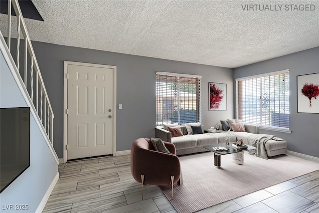 1372 Lorilyn Ave Unit 3, Las Vegas, NV 89119 - living room with stairway and a textured ceiling