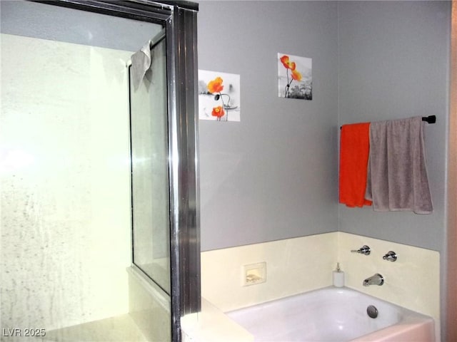3337 Partridge Run St, Laughlin, NV 89029 - full bath featuring a bath and a shower with shower door