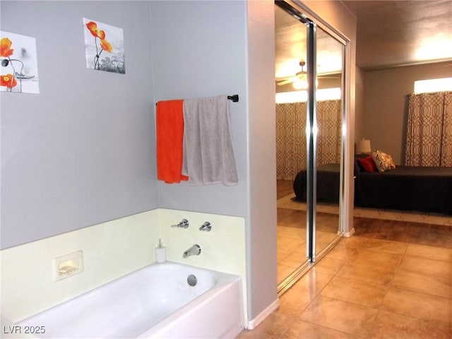 3337 Partridge Run St, Laughlin, NV 89029 - ensuite bathroom with a bath and tile patterned floors