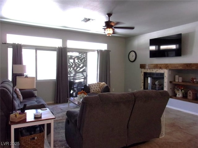 3337 Partridge Run St, Laughlin, NV 89029 - living area with ceiling fan and a tile fireplace