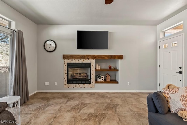 3337 Partridge Run St, Laughlin, NV 89029 - living room with a tiled fireplace and a ceiling fan