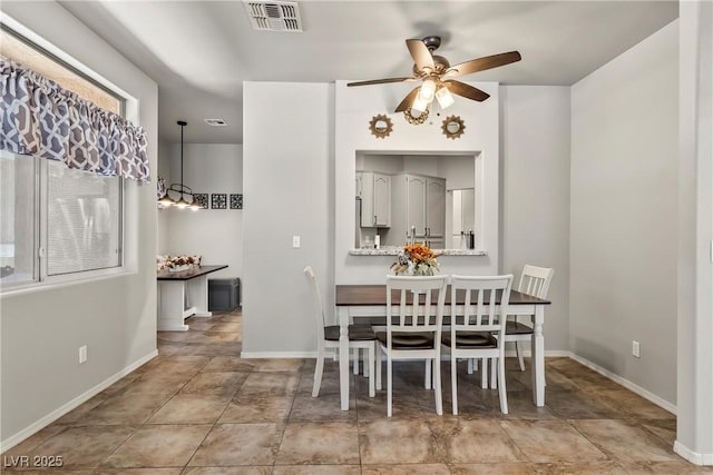 3337 Partridge Run St, Laughlin, NV 89029 - dining area with ceiling fan and baseboards