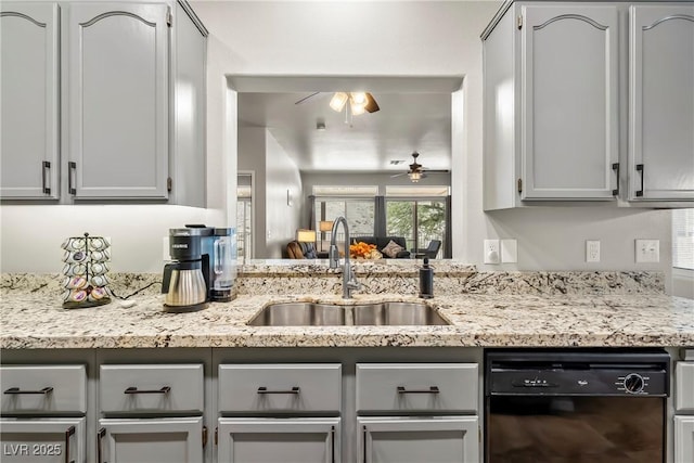 3337 Partridge Run St, Laughlin, NV 89029 - kitchen featuring ceiling fan, dishwasher, gray cabinets, and light stone countertops