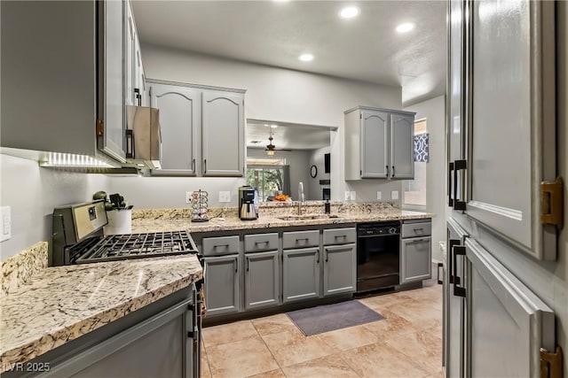 3337 Partridge Run St, Laughlin, NV 89029 - kitchen featuring stainless steel range with gas cooktop, black dishwasher, gray cabinets, recessed lighting, and refrigerator