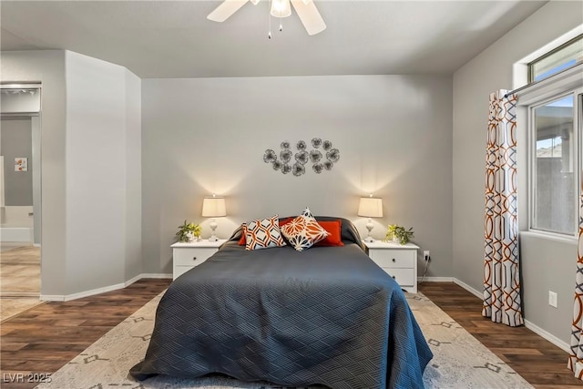 3337 Partridge Run St, Laughlin, NV 89029 - bedroom with dark wood-style floors and ceiling fan