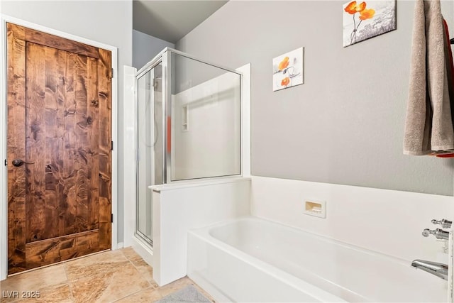 3337 Partridge Run St, Laughlin, NV 89029 - bathroom featuring a stall shower and a garden tub