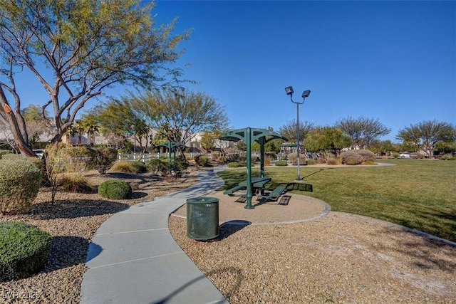 8768 Tom Noon Ave Unit 101, Las Vegas, NV 89178 - view of property's community with a lawn