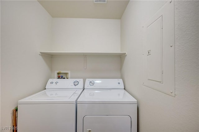 8768 Tom Noon Ave Unit 101, Las Vegas, NV 89178 - laundry room with separate washer and dryer and electric panel