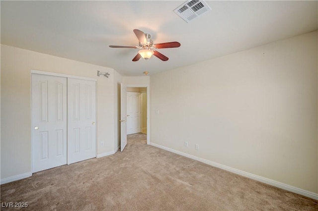 8768 Tom Noon Ave Unit 101, Las Vegas, NV 89178 - unfurnished bedroom with light carpet, a closet, and a ceiling fan