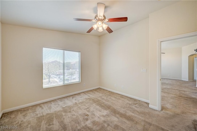 8768 Tom Noon Ave Unit 101, Las Vegas, NV 89178 - empty room featuring carpet flooring, a ceiling fan, and arched walkways