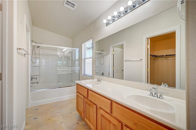 8768 Tom Noon Ave Unit 101, Las Vegas, NV 89178 - full bath featuring double vanity, bath / shower combo with glass door, and a spacious closet