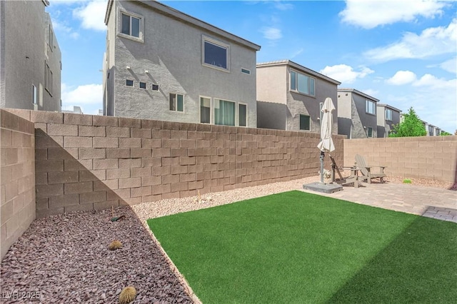 8072 Haywood Estate Ave, Las Vegas, NV 89113 - fenced backyard with a residential view and a patio