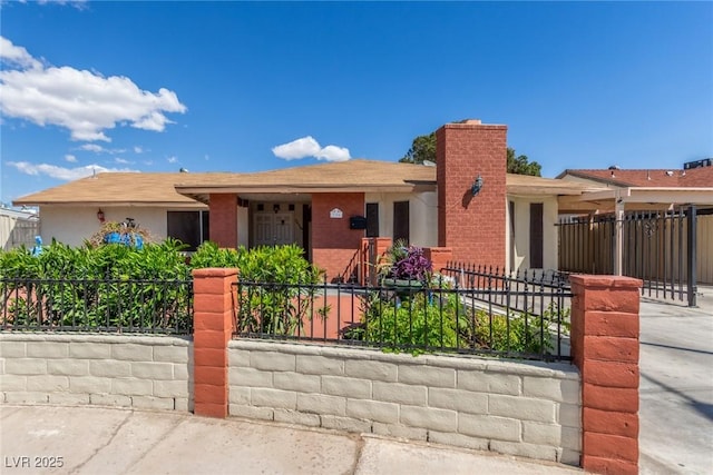 2254 Florence Ave, Las Vegas, NV 89119 - ranch-style house with a fenced front yard, a chimney, and stucco siding