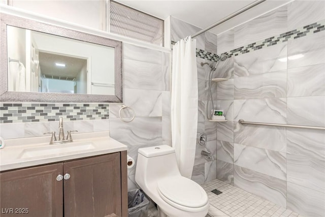 2254 Florence Ave, Las Vegas, NV 89119 - full bath with tile walls, tiled shower, vanity, and backsplash