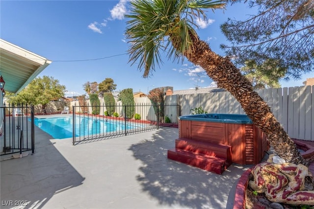 2254 Florence Ave, Las Vegas, NV 89119 - view of pool featuring a hot tub, a fenced backyard, and a patio area