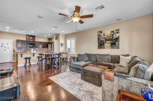 10312 Glimmering Star Dr, Las Vegas, NV 89178 - living area with ceiling fan, dark wood finished floors, and recessed lighting