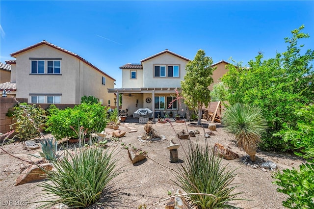10312 Glimmering Star Dr, Las Vegas, NV 89178 - back of house with stucco siding, ceiling fan, a patio area, and a tiled roof