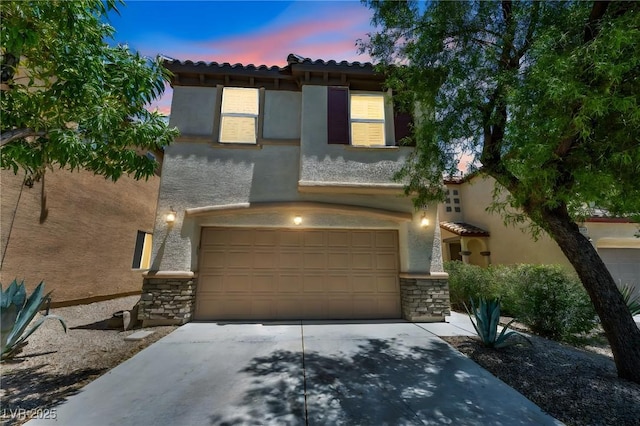 10312 Glimmering Star Dr, Las Vegas, NV 89178 - mediterranean / spanish-style home with a tile roof, stone siding, and stucco siding