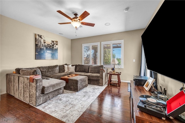 10312 Glimmering Star Dr, Las Vegas, NV 89178 - living area featuring dark wood finished floors and a ceiling fan