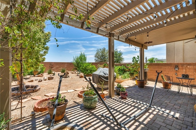 10312 Glimmering Star Dr, Las Vegas, NV 89178 - fenced backyard featuring a patio, a pergola, and area for grilling