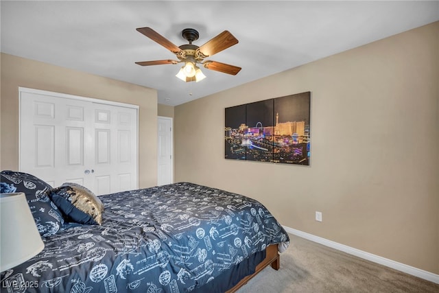 10312 Glimmering Star Dr, Las Vegas, NV 89178 - bedroom with carpet flooring, a closet, and a ceiling fan