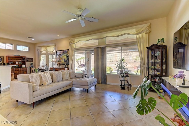 2605 Orchid Valley Dr, Las Vegas, NV 89134 - living area featuring light tile patterned floors, ceiling fan, and recessed lighting