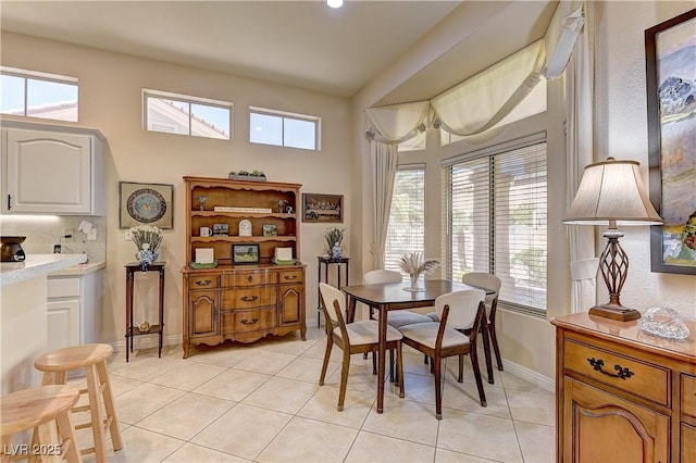 2605 Orchid Valley Dr, Las Vegas, NV 89134 - dining area featuring light tile patterned floors and plenty of natural light